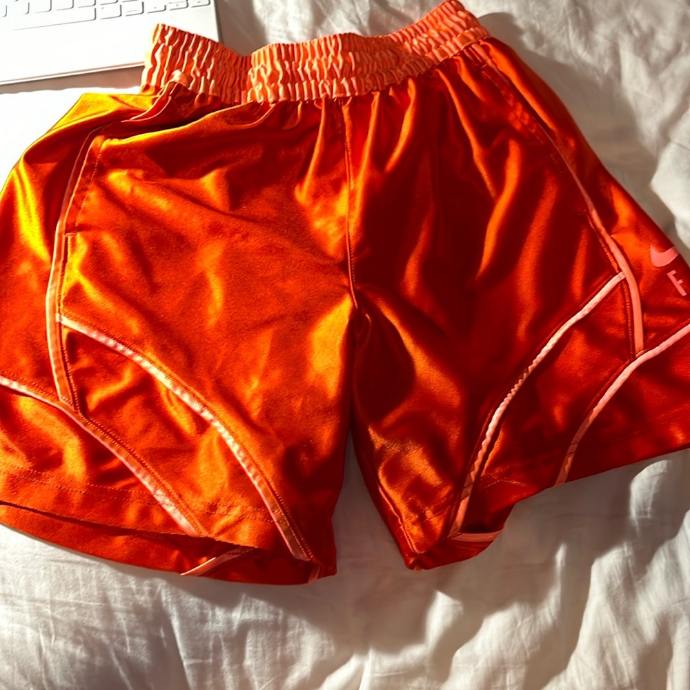 Orange NIKE Fly basketball shorts. Size small.